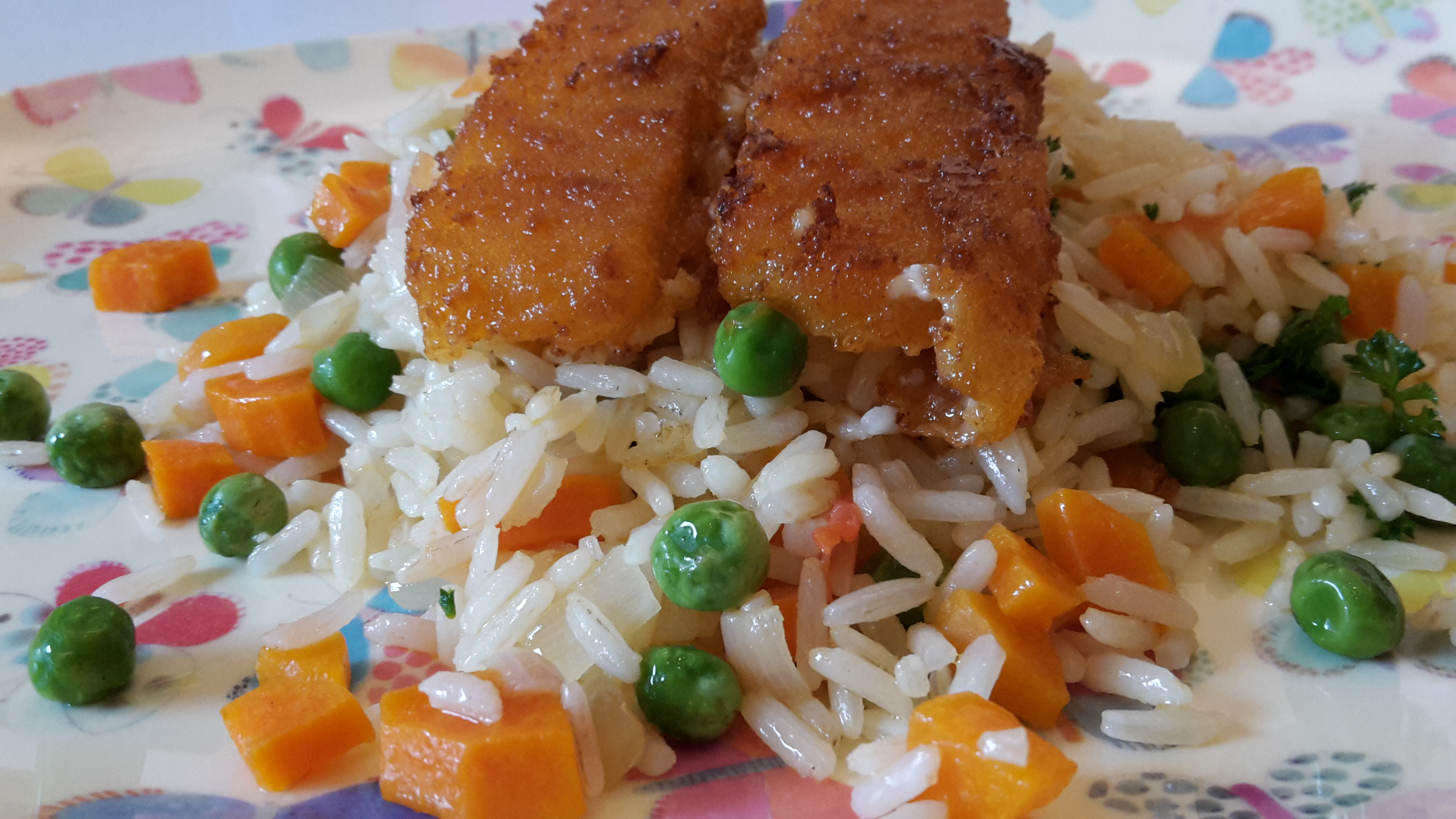 Gemüsereis mit Fischstäbchen